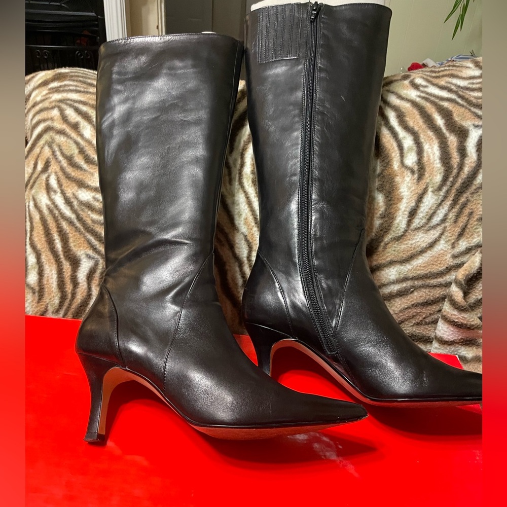 Knee-high leather boots.
